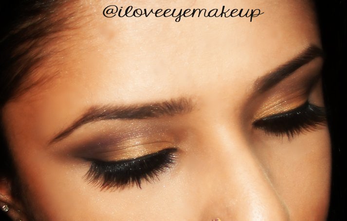 Gold and brown party makeup.